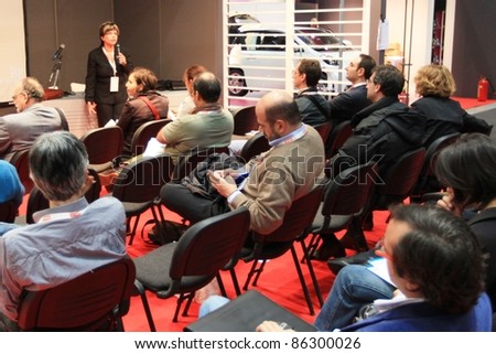 MILAN, ITALY - OCT. 20: People participate to business conference at SMAU, international fair of business intelligence and information technology October 20, 2010 in Milan, Italy.