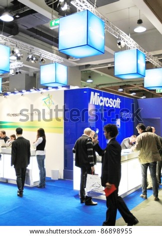 MILAN, ITALY - OCT. 20: People at Microsoft technologies stand during SMAU, international fair of business intelligence and information technology October 20, 2010 in Milan, Italy.