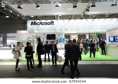 MILAN, ITALY - OCT. 19: People at Microsoft technologies area during SMAU, international fair of business intelligence and information technology October 19, 2011 in Milan, Italy.