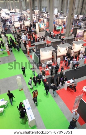 MILAN, ITALY - OCT. 19: People visit technologies stands at SMAU, international fair of business intelligence and information technology October 19, 2011 in Milan, Italy.