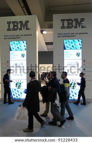 MILAN, ITALY - OCT. 19: People visit IBM technologies stands at SMAU, international fair of business intelligence and information technology October 19, 2011 in Milan, Italy.
