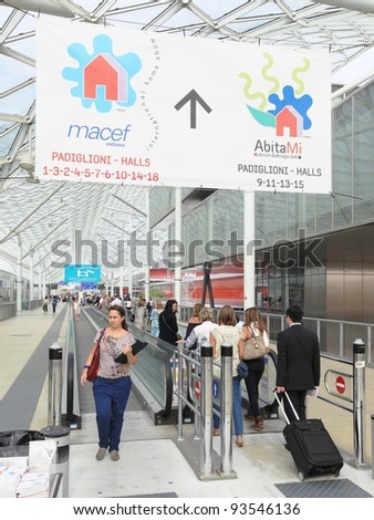 MILAN, ITALY - SEPTEMBER 09: People at the entrance of architecture and interior design exposition Macef, International Home Show Exhibition on September 09, 2011 in Milan, Italy.