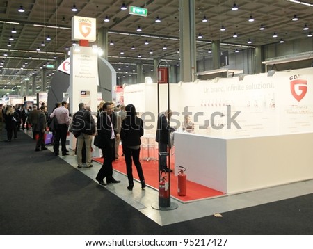 MILAN, ITALY - OCT. 19: People visit technologies stands at SMAU, international fair of business intelligence and information technology on October 19, 2011 in Milan, Italy.