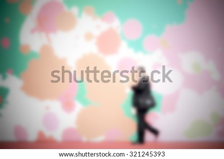 Profile of a man walking, generic background. Intentionally blurred post production.