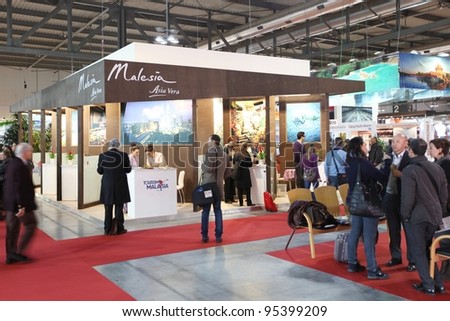 MILAN, ITALY - FEBRUARY 16: People visit Malaysia tourism exhibition area during BIT, International Tourism Exchange Exhibition February 16, 2012 in Milan, Italy.
