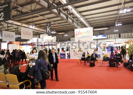 MILAN, ITALY - FEBRUARY 16: People visit international tourism exhibition area during BIT, International Tourism Exchange Exhibition February 16, 2012 in Milan, Italy.