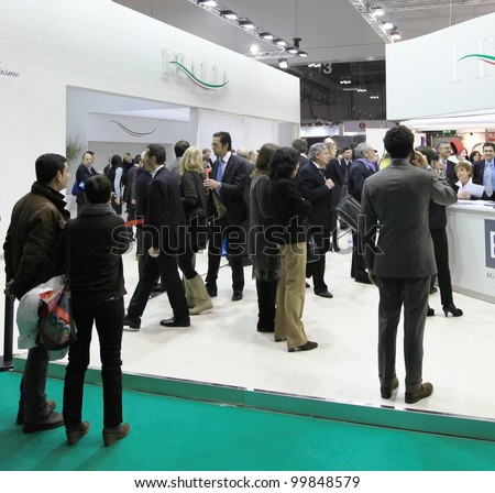 MILAN, ITALY - FEBRUARY 17: People visit Italy national tourism exhibition area at BIT, International Tourism Exchange Exhibition on February 17, 2011 in Milan, Italy.