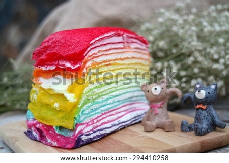 Crepe Cake Rainbow  on wooden plates
