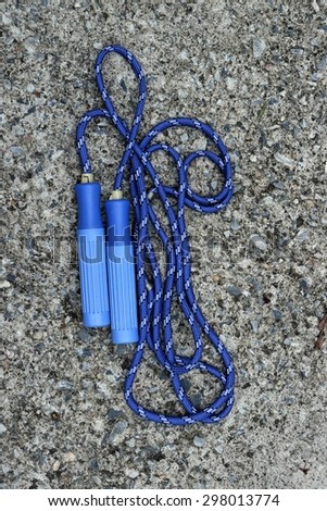 skipping rope for an exercise on cement floor