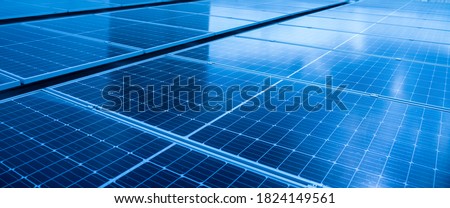 Close-up of Solar cell farm power plant eco technology.landscape of Solar cell panels in a photovoltaic power plant.concept of sustainable resources and renewable energy.blue tone. Stock fotó © 