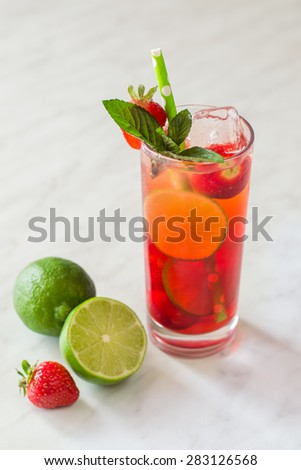 Strawberry lemonade with mint and lime