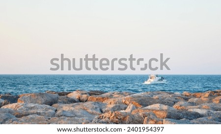 Similar – Image, Stock Photo Picturesque seaside with rocks at bright sunset