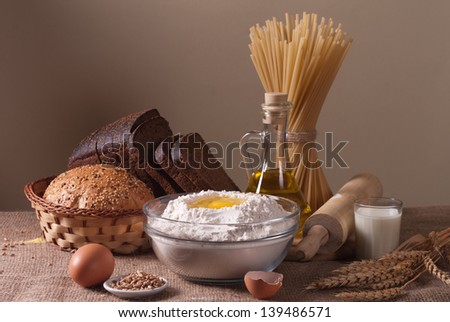 still life with bread, pasta and wheat