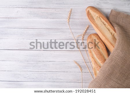 Freshly baked bread on wooden table