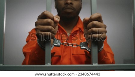 Similar – Image, Stock Photo Murderer, standing in black letters, as lettering, on an old squat house, with many windows, behind a brick wall painted with graffiti. Sign as an appeal against racism, war, hatred, violence, brutality and discrimination.