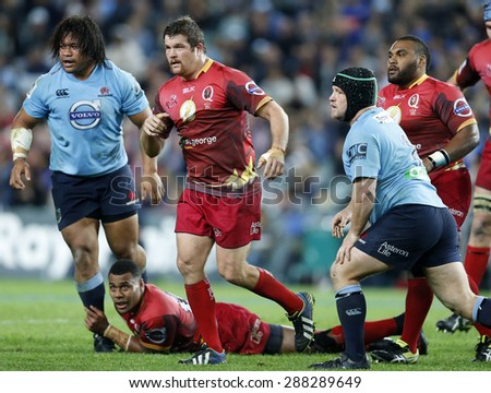 SYDNEY AUSTRALIA-June 2015, NSW Waratahs and Queensland Reds players in action during their Super Rugby clash at the Allianz Stadium, Sydney on 13 June 2015, in Australia
