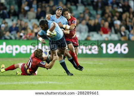 SYDNEY AUSTRALIA-June 2015, NSW Waratahs and Queensland Reds players in action during their Super Rugby clash at the Allianz Stadium, Sydney on 13 June 2015, in Australia