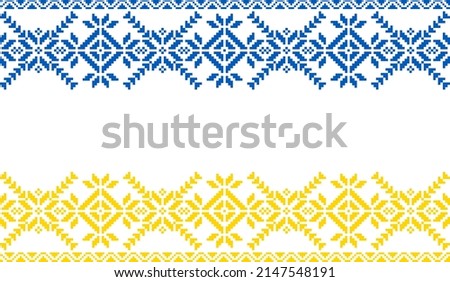 Embroidered Ukrainian ornament in national colors on a white background. Ukrainian flag. Ukrainian embroidery. Geometric patterns on a white background.  handmade cross-stitch Stockfoto © 