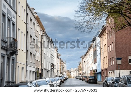 Similar – Image, Stock Photo Uniform facade of an office building with rows of vertical windows