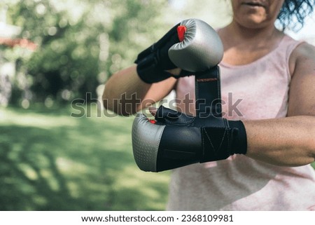 Similar – Image, Stock Photo Unrecognizable female athlete with mobile phone