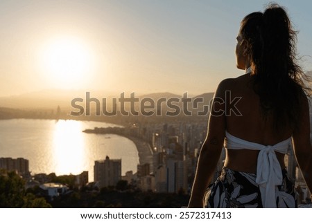 Similar – Image, Stock Photo Anonymous traveler admiring landscape of volcano under cloudy sky