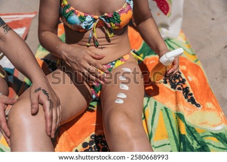 Similar – Image, Stock Photo Anonymous woman sunbathing on rocky beach