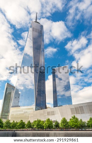 NEW YORK - JUNE 14, 2014: 9/11 Memorial site and One World Trade Center, in New York City, USA