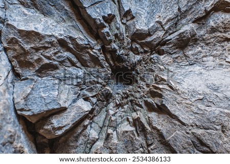 Similar – Foto Bild Felsen, der unter Wolkenverhangenem Himmel mickrig klein wirkt.