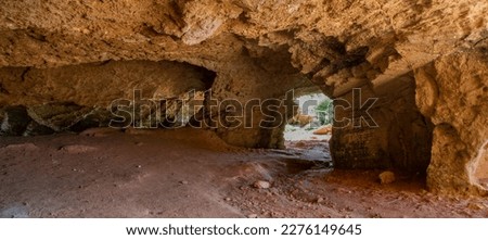 Similar – Image, Stock Photo Rough cave near sea during sunset