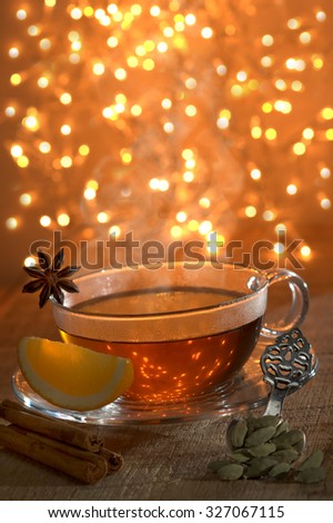 Hot spice tea with cinnamon, orange, cardamom and star anise