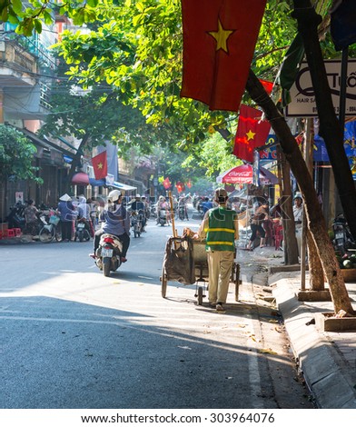 Namdinh, VIETNAM - August 7, 2015:  sanitation workers on the road