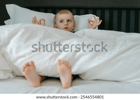 Similar – Image, Stock Photo Little boy with a surfboard on the beach