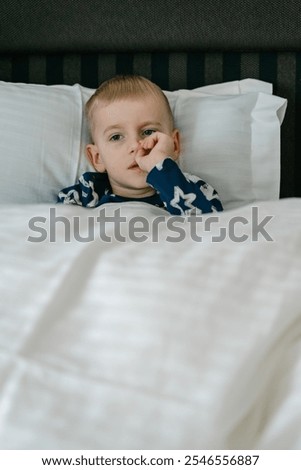 Similar – Image, Stock Photo Little boy with a surfboard on the beach