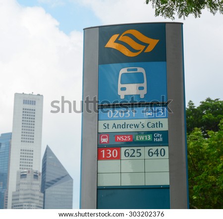Singapore - May 10, 2015. Bus stop at St Andrew\'s Cathedral. Buses form a significant part of public transportation in Singapore, with over three million rides taken per day on average.