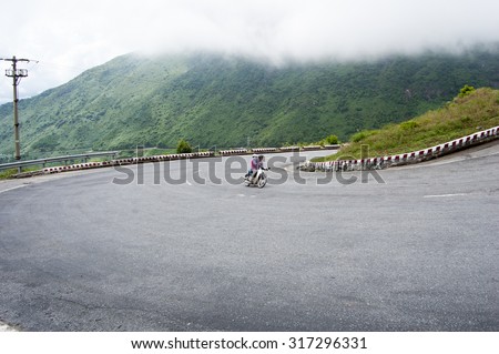 Hue, Vietnam - Sep 1, 2015. The mountain road on Hai Van pass in Hue, Vietnam. Hai Van is the most spectacular highway in Vietnam.
