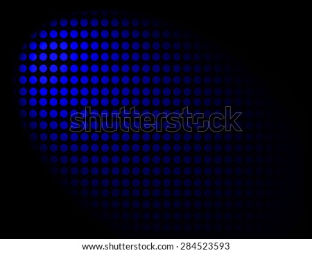 Circular holes in a black metal plate allow blue light to shine through