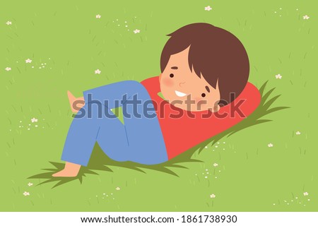Cute Boy Lying Down on Green Lawn, Kid Lying on Grass Dreamily Looking into Sky Cartoon Vector Illustration ストックフォト © 