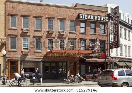 New York, New York, USA - May 12, 2011: The Old Homestead Steak House in New York City. This well known steakhouse dates back to the 1800\'s. It is located on 9th avenue between 14th and 15th streets.