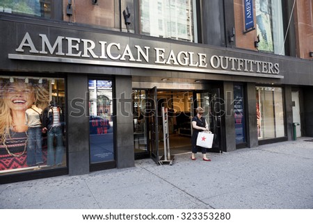 New York, New York, USA - October 2, 20New York, New York, USA - October 2, 2011: A woman exits an American Eagle Outfitters store on 34th street in New York City.