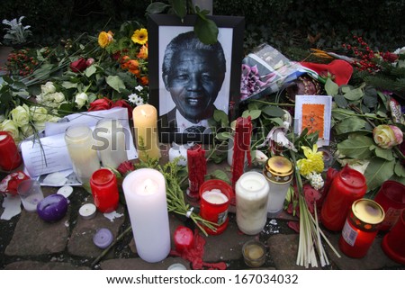 DECEMBER 12, 2013 - BERLIN: mourning for Nelson Mandela: flowers, candles and images at the South African Embassy in Berlin.