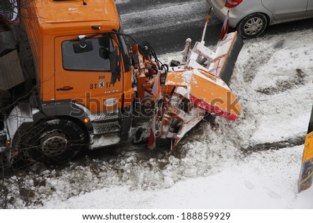 CIRCA DECEMBER 2010 - BERLIN: winter impressions: snow removal on a street in the Prenzlauer berg district of Berlin.