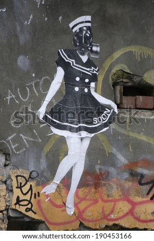 CIRCA MARCH 2014 - BERLIN: street art/ graffiti in Berlin: girl with gas mask.