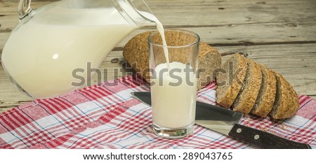 milk jug with grain bread