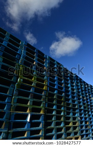Blue pallet boards, Jersey, U.K.
Wide angle image of re-used transport crates to protect goods. Stok fotoğraf © 