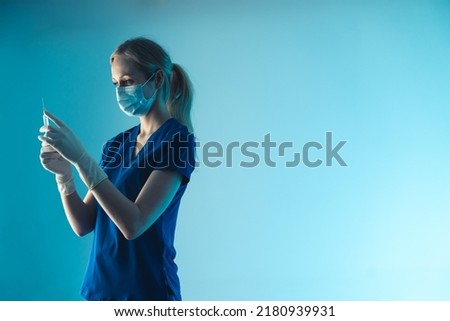 Similar – Image, Stock Photo Female doctor silhouette holding a vaccine in hand