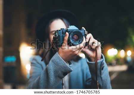 Similar – Image, Stock Photo Female tourist taking shot of sea in twilight