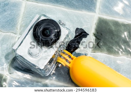 BANGKOK, THAILAND - JULY 7, 2015:Photo of Xiaomi Yi Action Camera In Waterproof Case In The Water, lightweight action camera by Xiaomi (China)