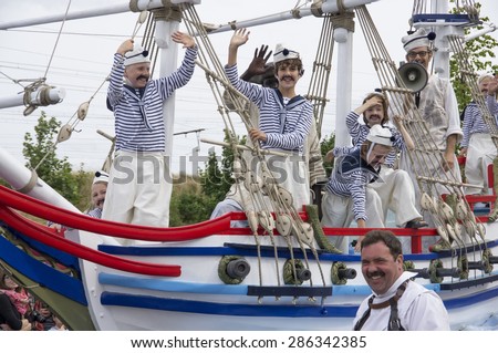 Children dressed as vintage navy sailors on a ship. Shot at a public event. Hanswijk cavalcade in Mechelen,2013.