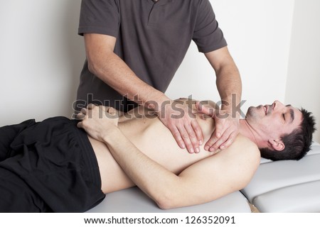 chiropractor applying myofascial therapy