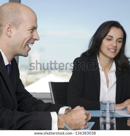 Real Estate Agent smiling in office